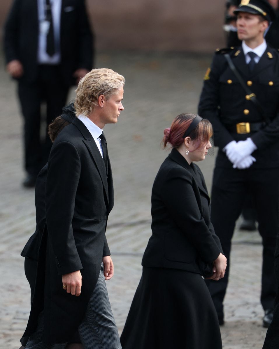 Son of Queen Mette-Marit of Norway Marius Borg Hoiby (L) arrives in front of Oslo Cathedral for the funeral ceremony of late King Harald V of Norway in Oslo