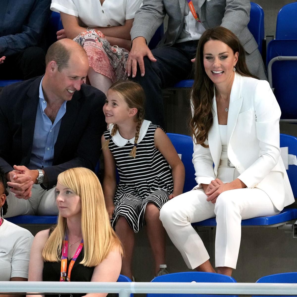 William was all smiles as he watched Charlotte at the event.