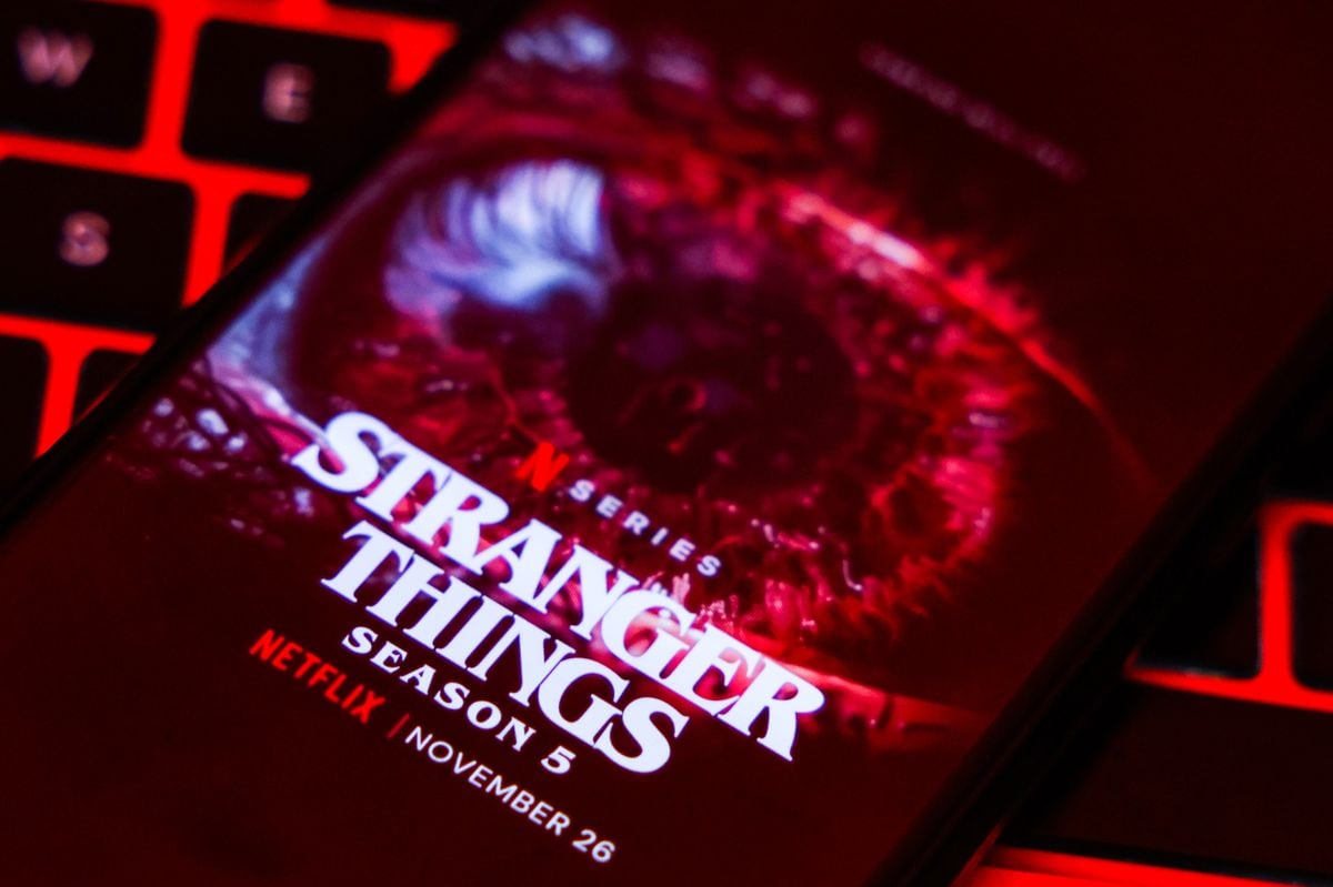 'Stranger Things' seson 5 publicity is displayed on a mobile phone screen for illustration photo. Gliwice, Poland on November21st, 2025. Stranger Things 5 Volume 1 will premiere on Netflix with the first four episodes on November  226th,  followed by three episodes on Christmas, and the finale episode on New Year's Eve. (Photo by Beata Zawrzel/NurPhoto via Getty Images) 