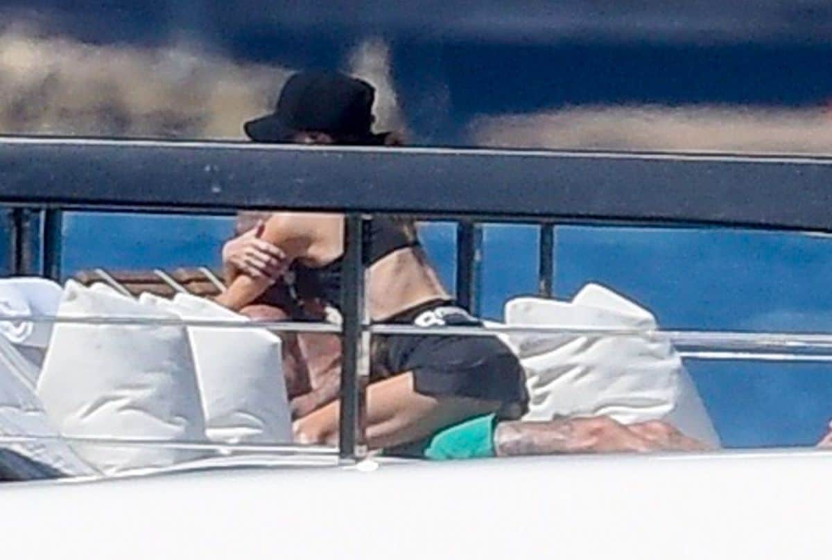 The pair cuddled together aboard their super yacht