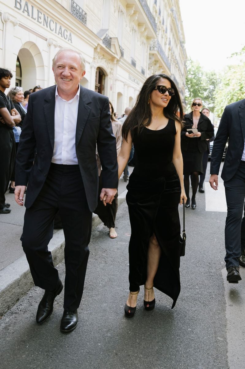 Salma Hayek with her husband François Henri-Pinault at Paris Fashion Week in coordinated looks