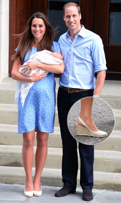 The Duchess chose wedges for style and comfort as she and Prince William introduced little <a href="https://us.hellomagazine.com/tags/1/prince-george/"><strong>Prince George</strong></a> to the world.
<br>
Photo: Getty Images