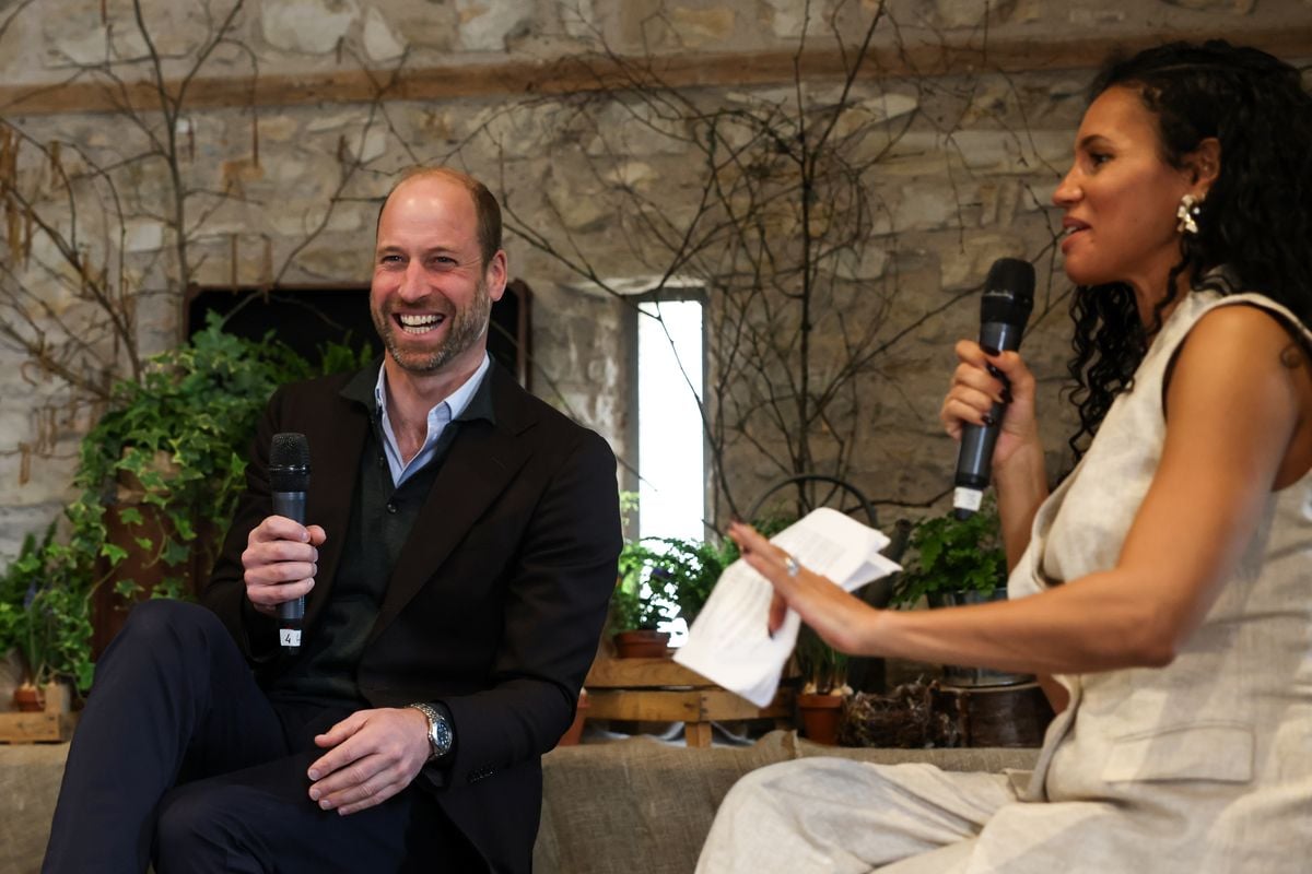 Prince William, Prince of Wales (L) speaks on stage with representatives of the organisation 'We are farming minds'