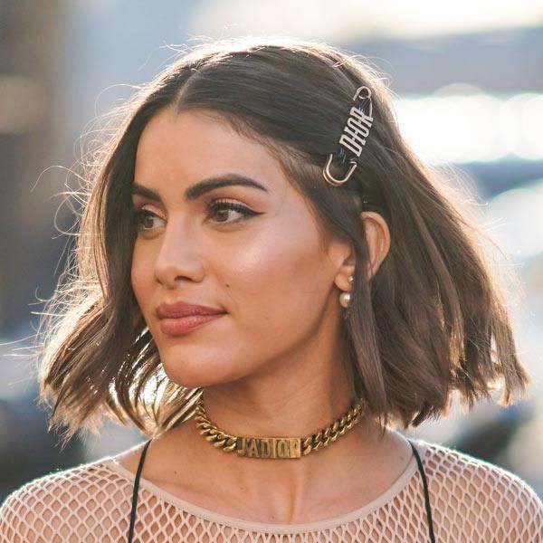 Camila Coelho with Dior barretes