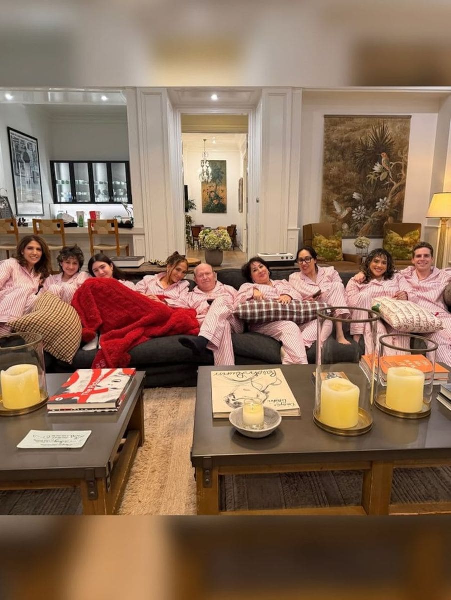 Jennifer Lopez ditched sequins for pink pajamas on Christmas eve, and the look was stylish and comfy