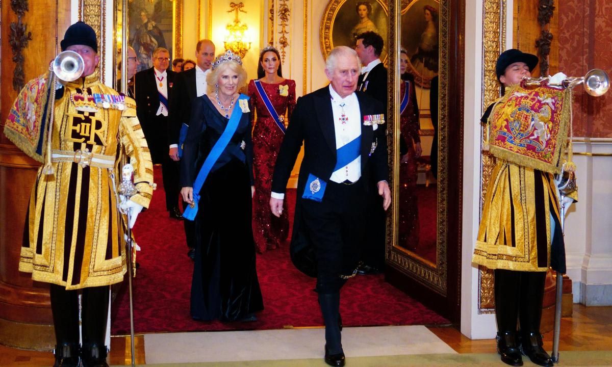 Her Majesty donned an elegant gown by Anna Valentine.