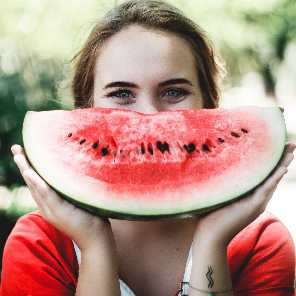 woman with a watermelon