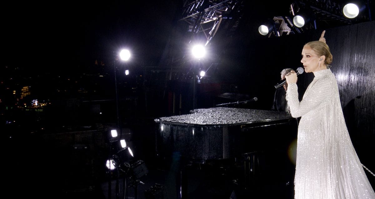 This handout, released by the Olympic Broadcasting Services, shows a view of singer Celine Dion performing on the Eiffel Tower during the opening ceremony of the Paris 2024 Olympic Games Paris 2024 on July 26, 2024, in Paris, France. (Screengrab by IOC via Getty Images)