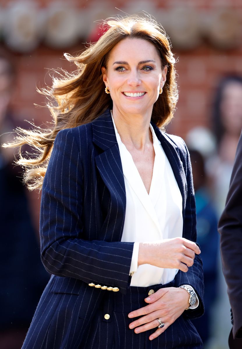 The elegant Cartier timepiece features distinctive blue hands that complement Kate's sapphire engagement ring.