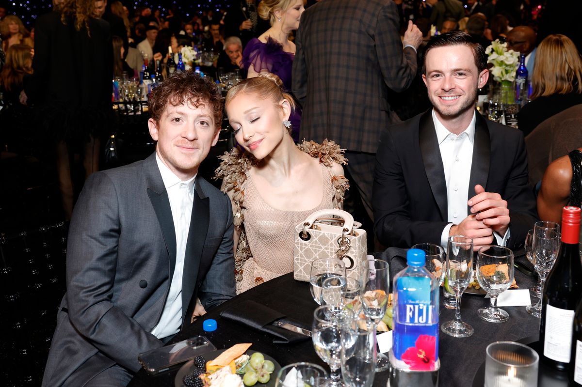 SANTA MONICA, CALIFORNIA - FEBRUARY 07: (L-R) Ethan Slater, Ariana Grande and a guest attend FIJI Water at The 30th Critics Choice Awards at Barker Hangar on February 07, 2025 in Santa Monica, California. (Photo by Stefanie Keenan/Getty Images for FIJI Water) 