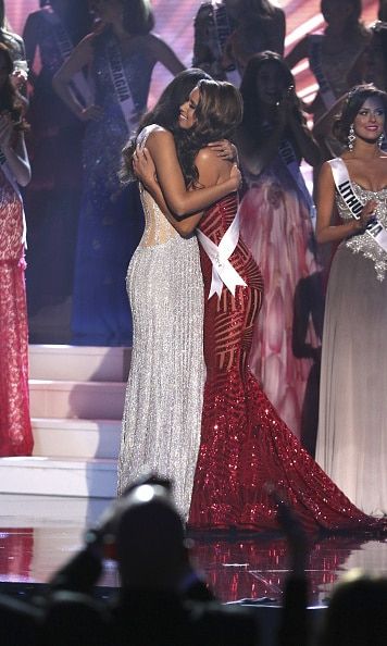 Miss Colombia Paulina Vega is congratulated by Miss USA Nia Sanchez onstage
Photo Getty Images
