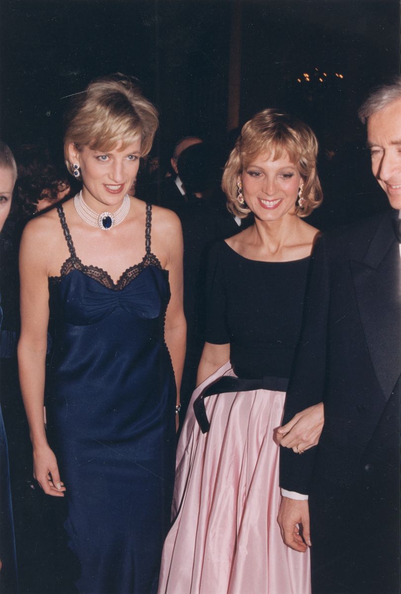 Princess Diana joins Hélène Arnault and Bernard Arnault at the Costume Institute's "Christian Dior Spirit" exhibition and gala in New York City on December 10, 1996.