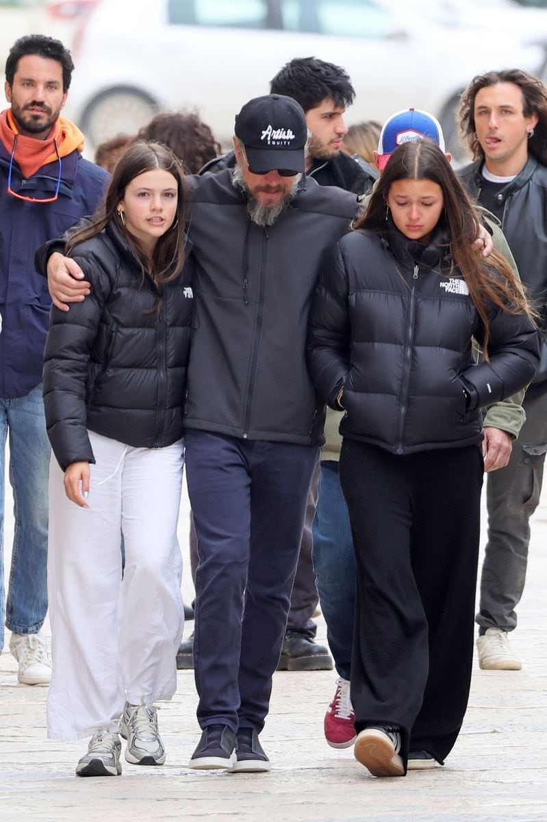 Matt Damon seen comforting his daughter on the picturesque island of Favignana, off the coast of Sicily, during a family moment.