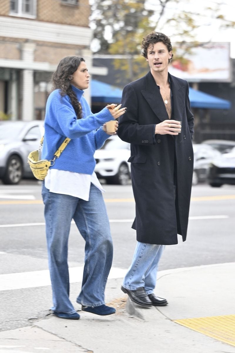 
Shawn Mendes was seen grabbing coffee at Café Muro in Los Feliz with Portuguese singer, Maro. The duo kept it casual during the morning outing grabbing coffee and walking around the neighborhood.