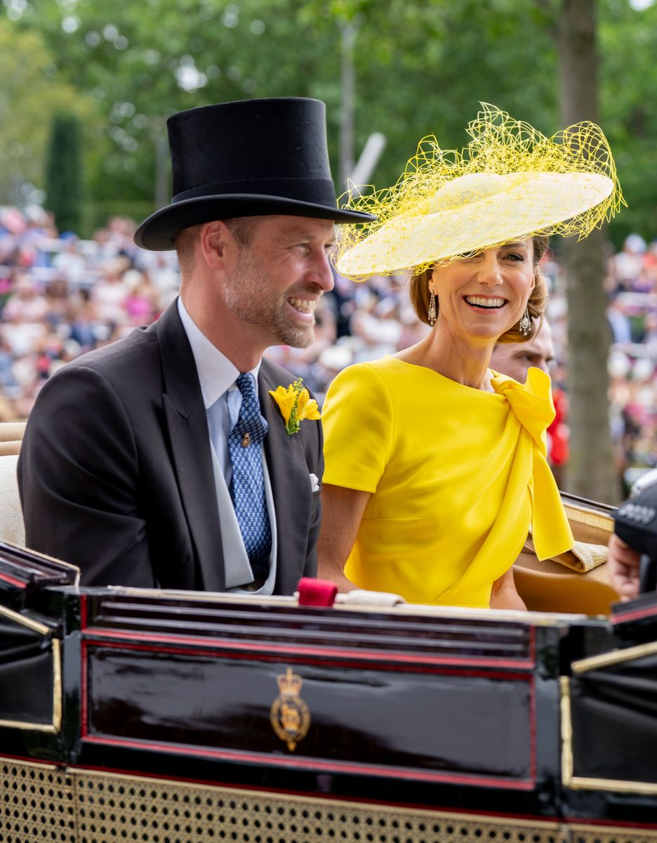 Kate's elegant beauty look featured a sleek low chignon, allowing her statement earrings to take center stage.