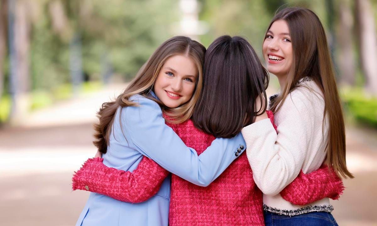 Letizia was sandwiched between her two girls in one tender photo.