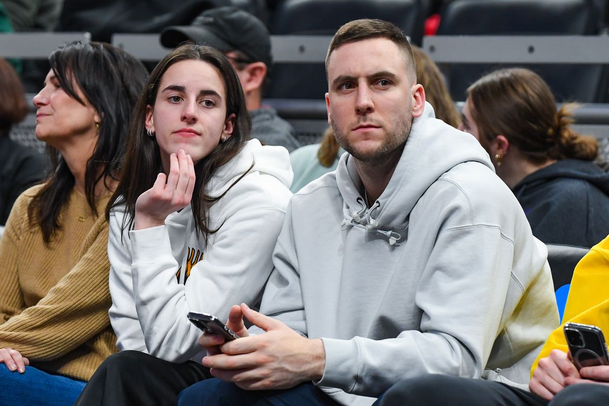 WNBA star and former Iowa Hawkeye Caitlin Clark (L) and boyfriend Connor McCaffery