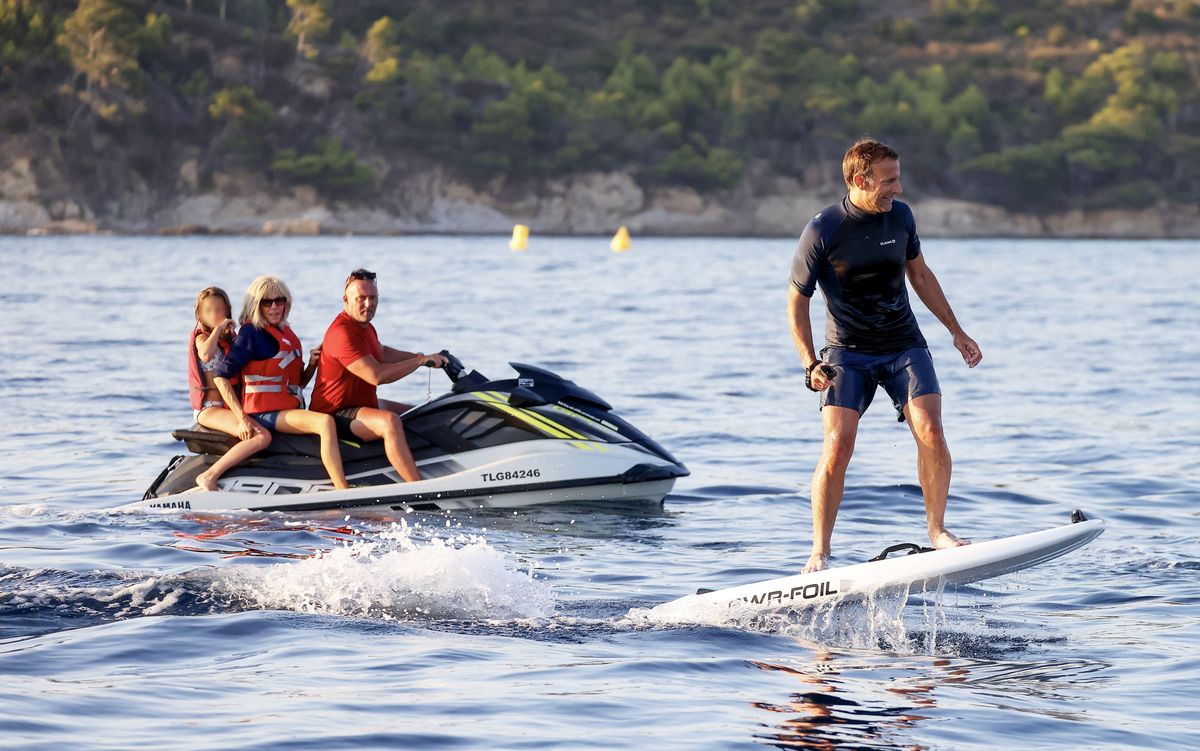 Emmanuel and Brigitte Macron alongside their grandkids