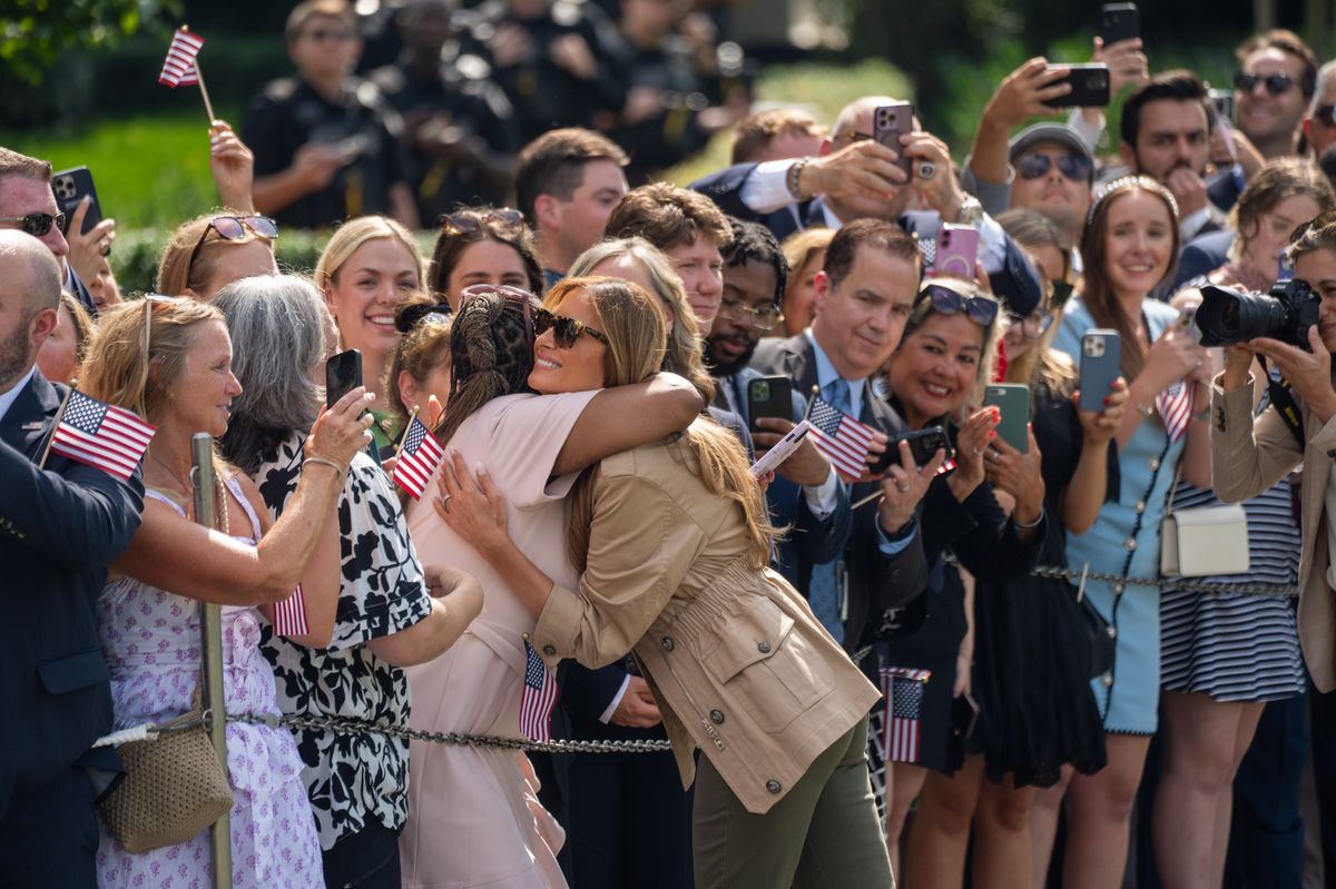 Melania also took a moment to greet and hug supporters before entering the aircraft.