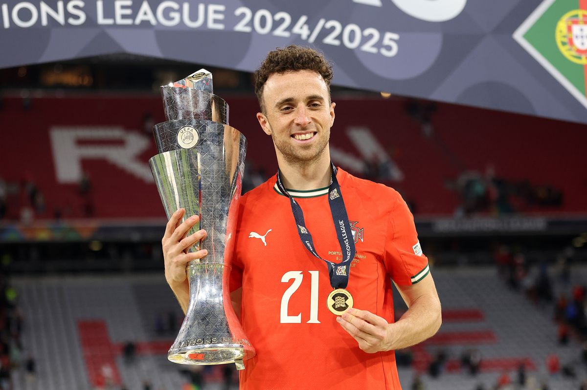 MUNICH, GERMANY - JUNE 08: Diogo Jota of Portugal poses for a photograph with the UEFA Nations League trophy after his team's victory in the UEFA Nations League 2025 final match between Portugal and Spain at Munich Football Arena on June 08, 2025 in Munich, Germany. (Photo by Maja Hitij - UEFA/UEFA via Getty Images)