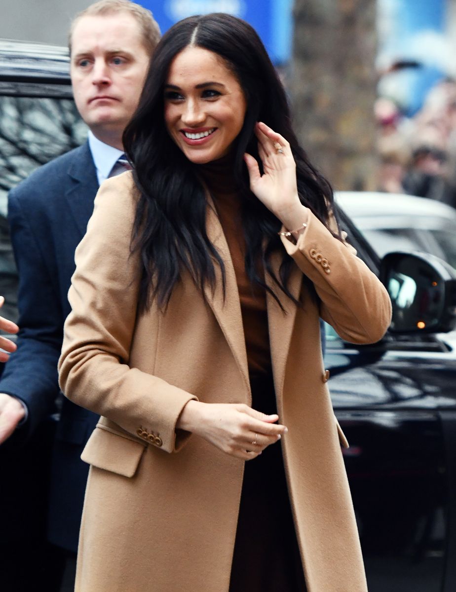 Tailored coats, midi dresses and classic pumps were staples of Meghan's wardrobe while representing the royal family.