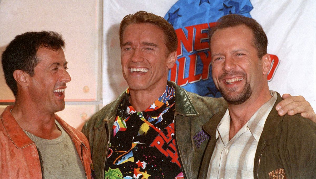 Stallone, Schwarzenegger and Willis at Planet Hollywood in 1990