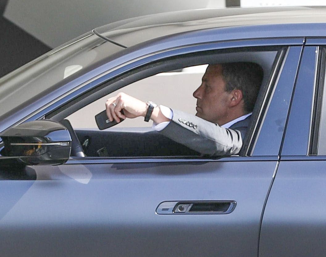 Ben Affleck arrived at his office looking sharp in a gray suit and carrying a leather duffel bag.