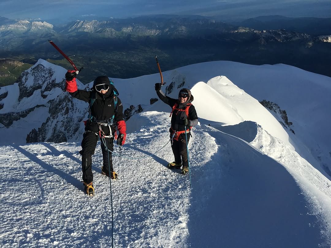 Paul and Margarita arriving at the summit of the highest mountain in France and Italy, Mont Blanc. 