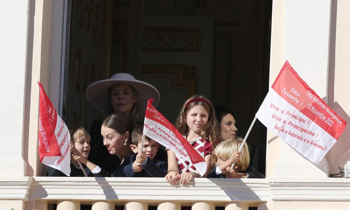 Some of Princess Caroline's grandchildren adorably waved flags from the palace balcony.