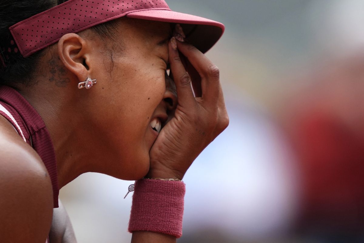 Japan's Naomi Osaka reacts during her women's singles match against Spain's Paula Badosa on day 2 of the French Open tennis tournament on Court Philippe-Chatrier at the Roland-Garros Complex in Paris on May 26, 2025.