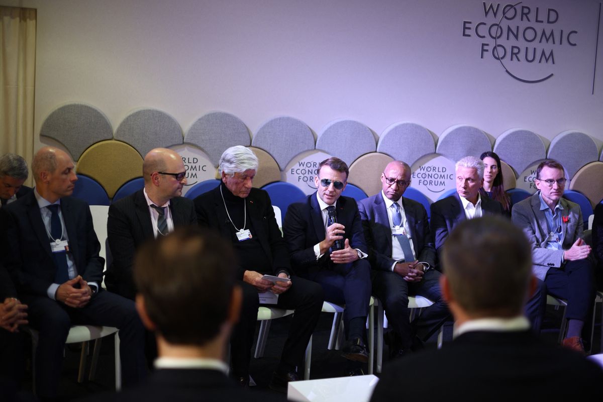 Macron alongside AI leaders at the World Economic Forum annual meeting in Davos, Switzerland