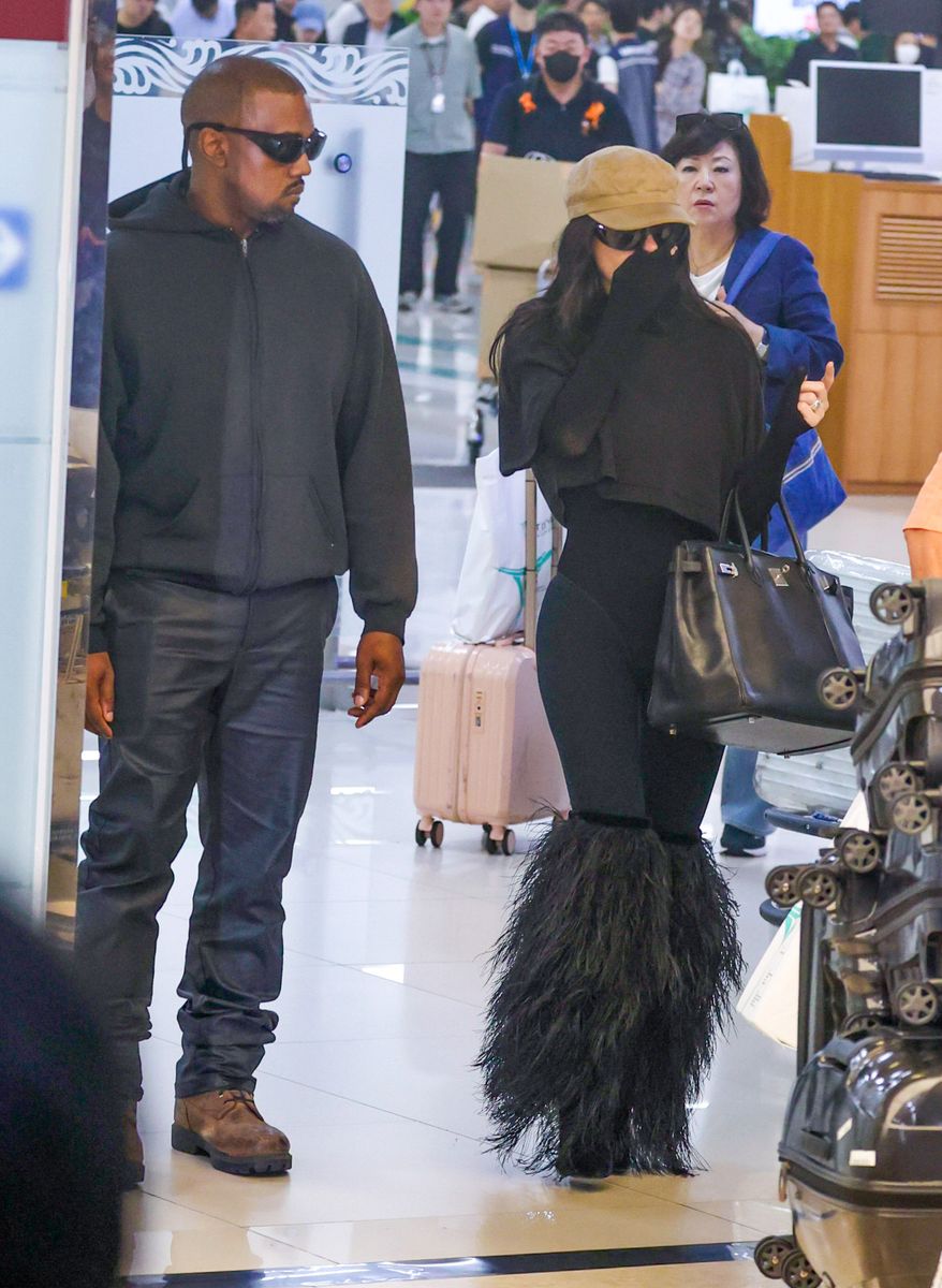 
Kanye West arrives in Seoul with wife Bianca Censori, greeted by crowds of fans in South Korea. 