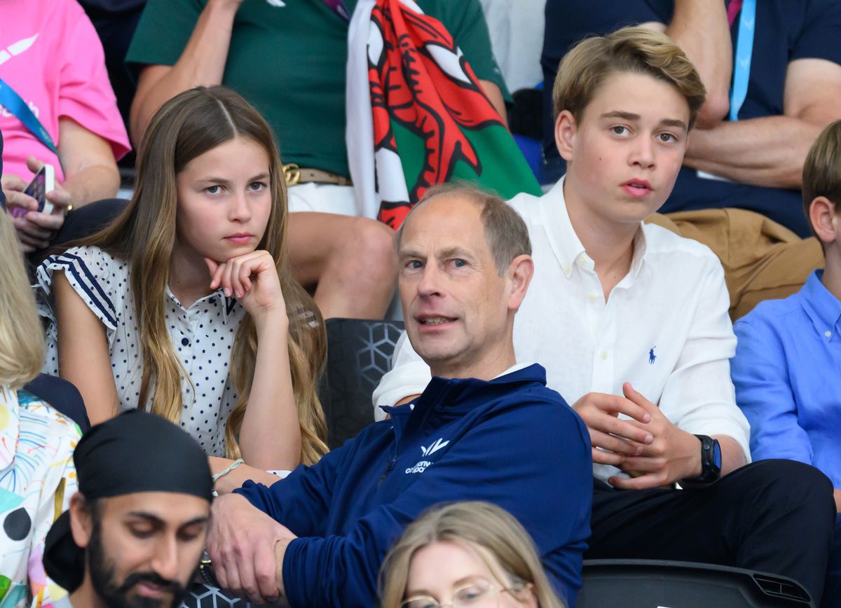 Prince Edward shares a lighthearted exchange with Princess Charlotte and Prince George from the stands at the Sir Chris Hoy Velodrome.