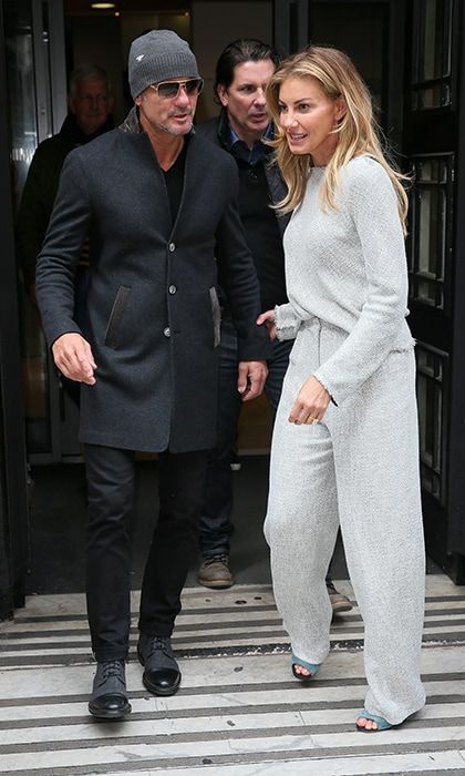 Tim and wife Faith Hill are seen here together on March 8 for a radio show appearance in London, days before his collapse.
Photo: WENN