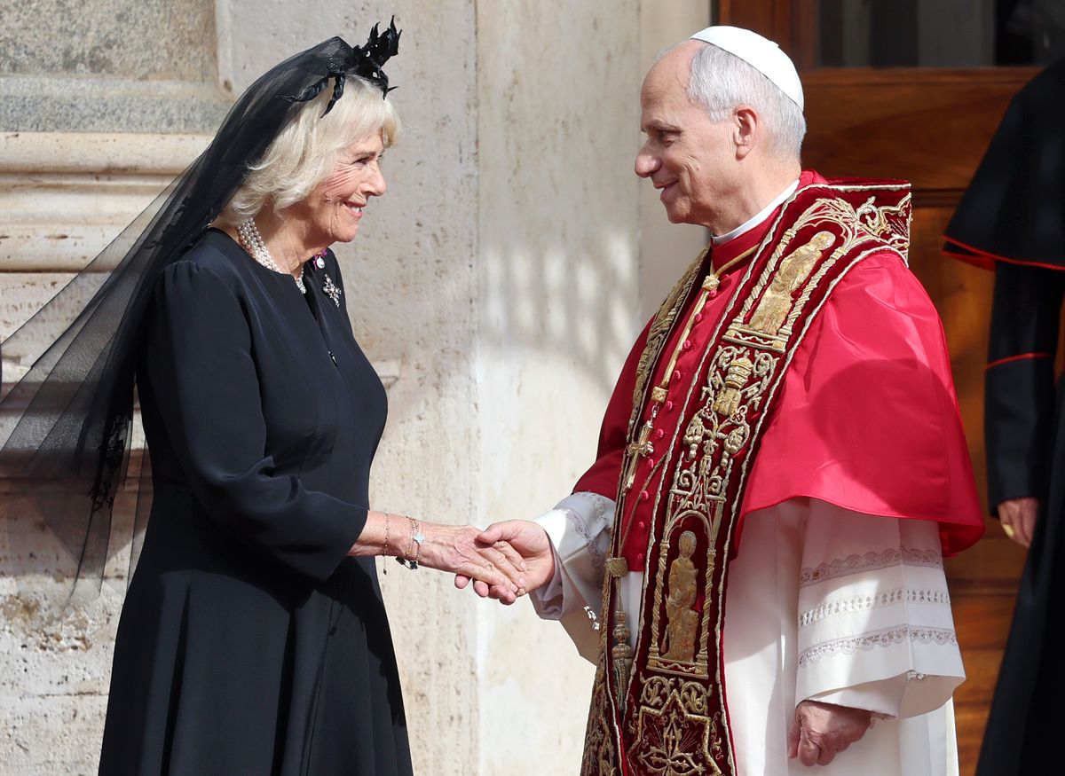 Queen Camilla wore all black for the occasion, wearing a headpiece previously owned by Queen Elizabeth