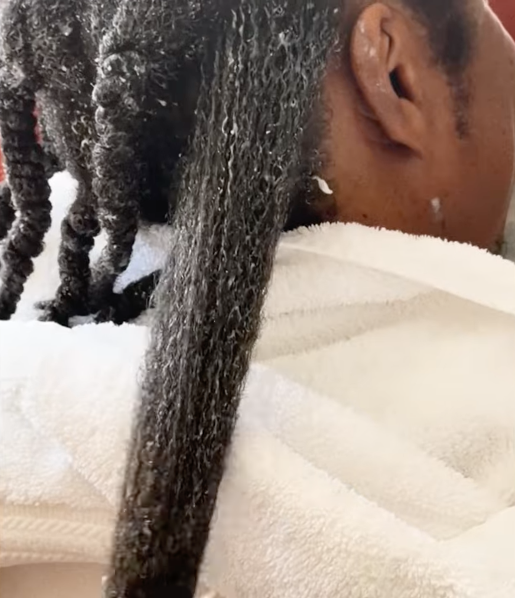They relied on detangling spray, deep conditioner, and moisturizing lotion to create enough slip to carefully separate the strands without causing unnecessary damage.