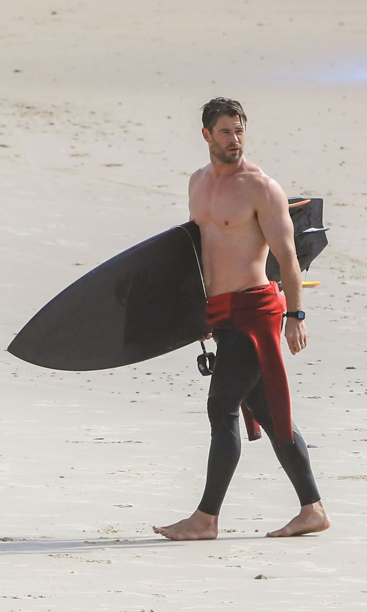 Chris Hemsworth surfing