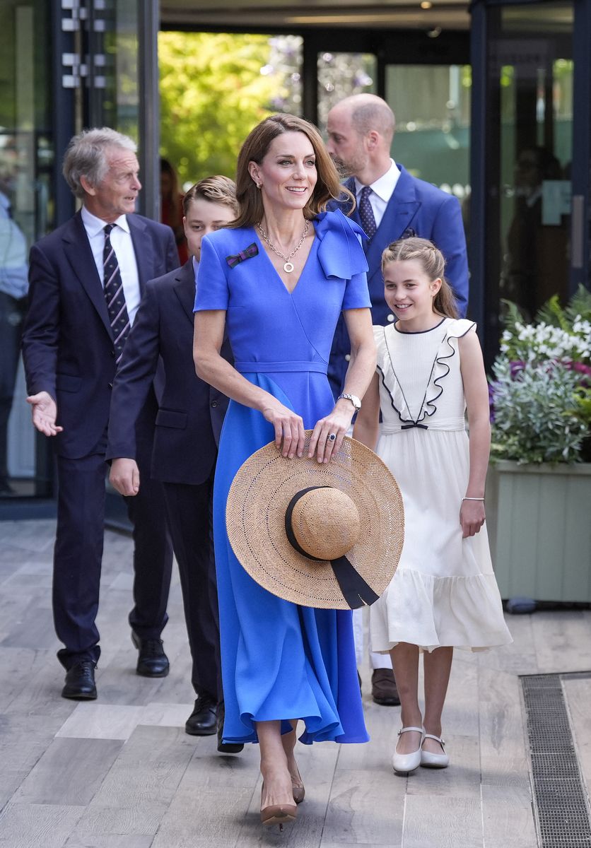 Princess Charlotte once again mirrored her mother’s style at Wimbledon, wearing a bespoke white dress with navy-trimmed ruffles designed by Sarah Burton