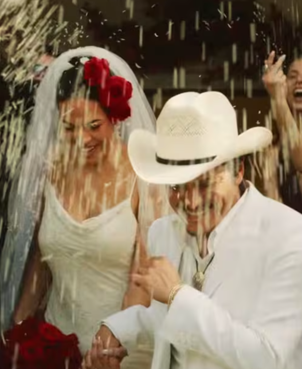 Bruno Mars celebrates love and Latino culture in the “Risk It All” music video, appearing at a wedding altar as mariachi sounds introduce his new album The Romantic.
