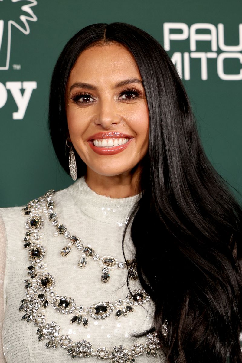 Vanessa Bryant's makeup looks classic with glowy skin, soft contouring, and a glossy neutral lip.
