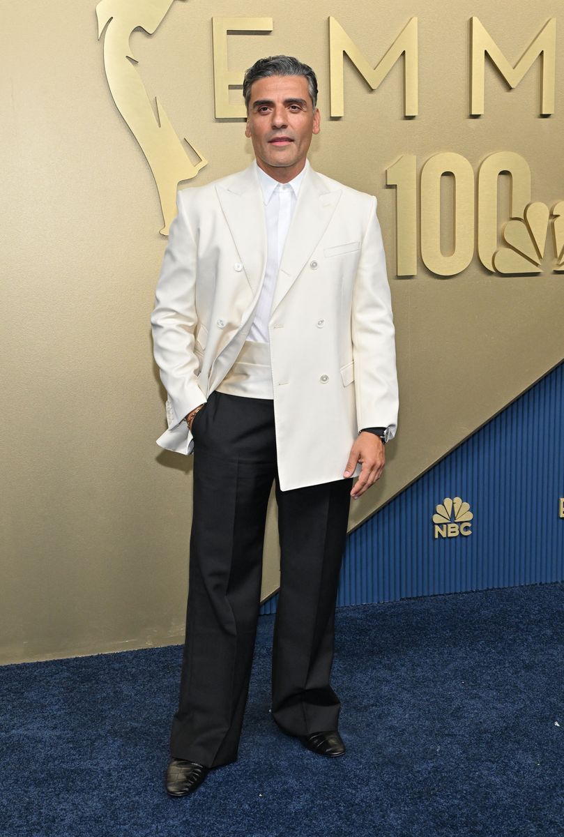 The actor paired a white double-breasted jacket with black trousers, a crisp white shirt and a matching white cummerbund.