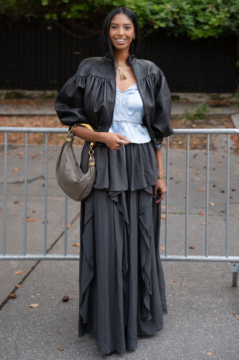 The layered jewelry sat against the pale blue satin and lace, giving the romantic top a more eclectic finish.