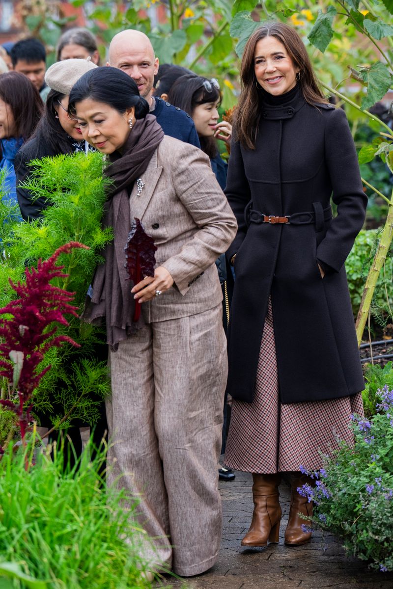 Queen Mary's royal wardrobe highlighted her versatile style, from sparkling jewels and formal gowns to contemporary tailoring and classic outerwear.