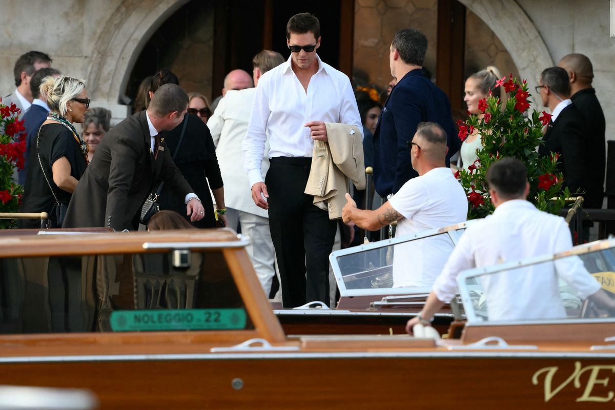 Tom Brady gets on a taxi boat at the Gritti Palace Hotel ahead of the wedding of Amazon's founder Jeff Bezos with Lauren Sanchez in Venice on June 26, 2025. 