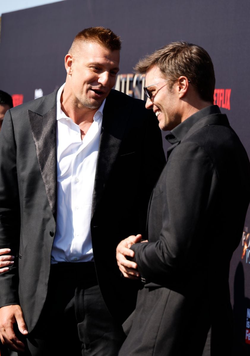 (L-R) Rob Gronkowski and Tom Brady attend Netflix Is A Joke Fest's "The Greatest Roast Of All Time: Tom Brady" at The Kia Forum on May 05, 2024 in Inglewood, California. (Photo by Frazer Harrison/WireImage)