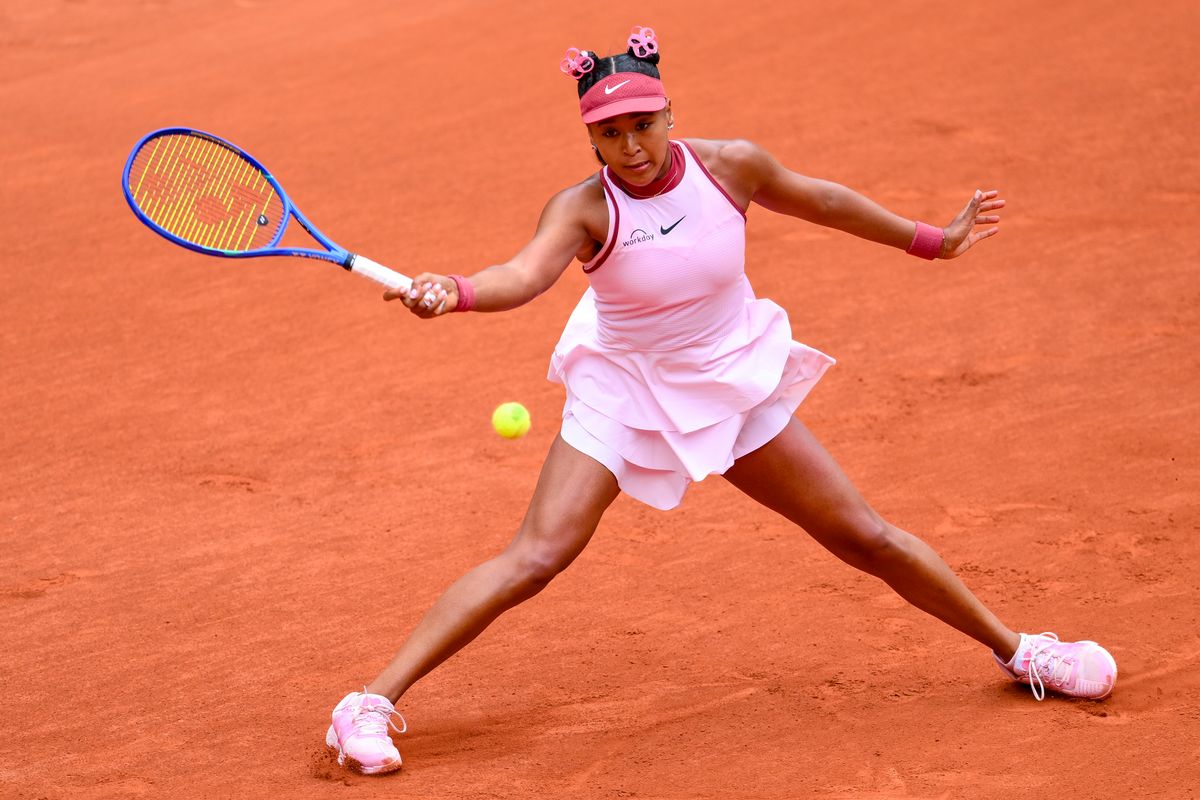 Naomi Osaka of Japan plays a forehand against Paula Badosa of Spain during the Women's Singles First Round match on Day Two of the 2025 French Open at Roland Garros on May 26, 2025 in Paris, France. 