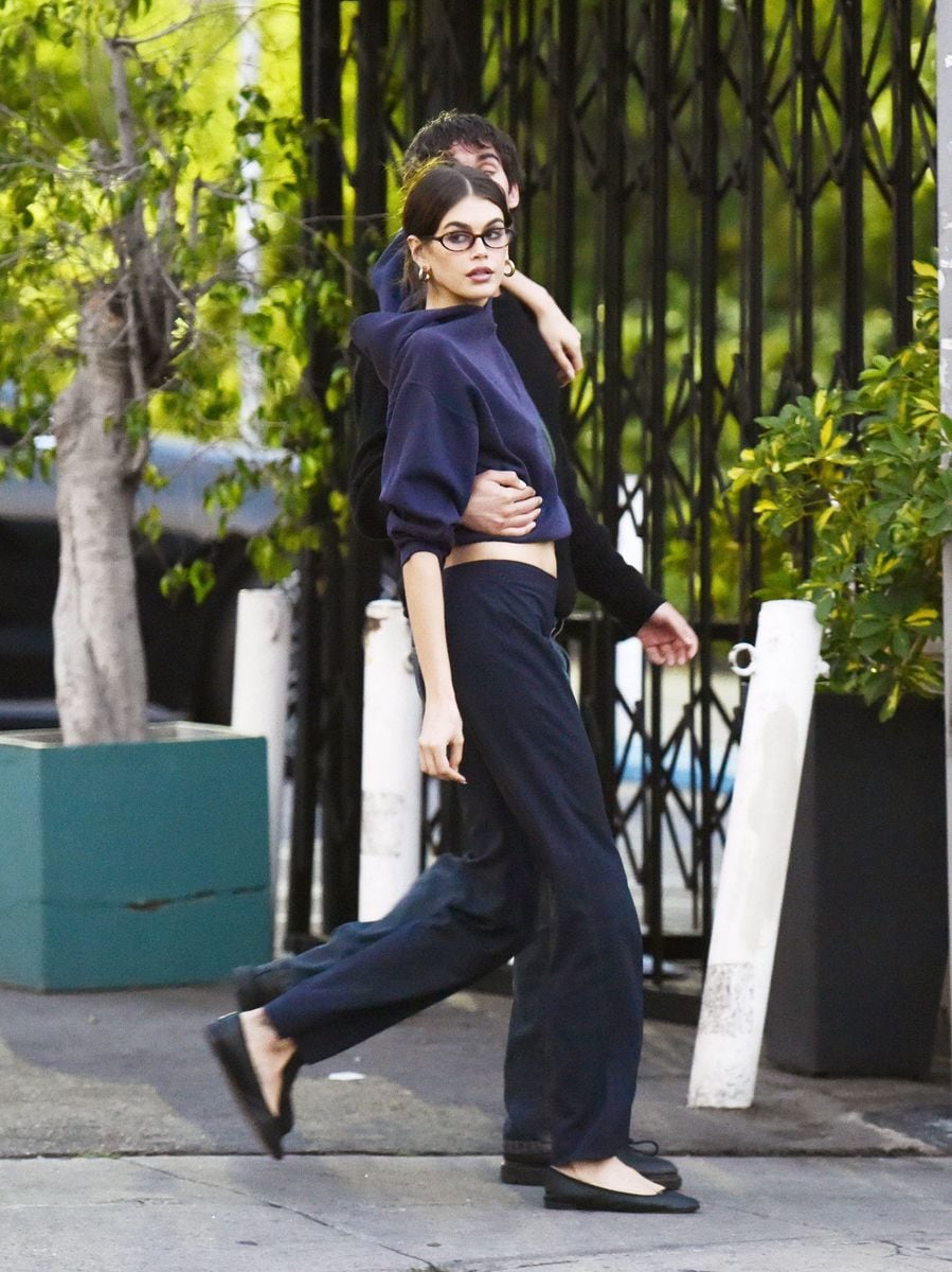  Kaia Gerber steps out arm in arm with her friend Travis Jackson