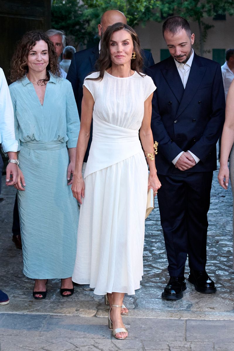 Queen Letizia stuns in a white corset dress and bold gold bracelet at Mallorca’s film fest