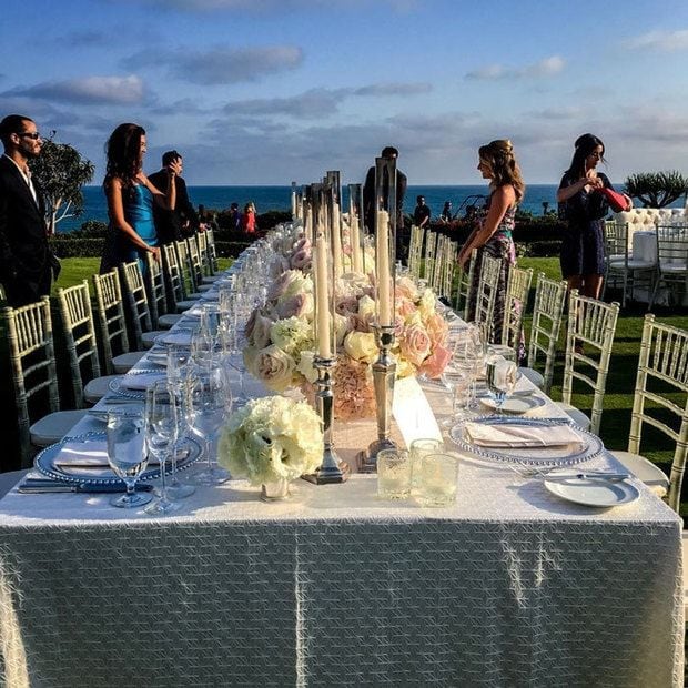 The reception featured stunning ocean views and beautiful floral arrangements.
<br>
Photo: Instagram/@djmos