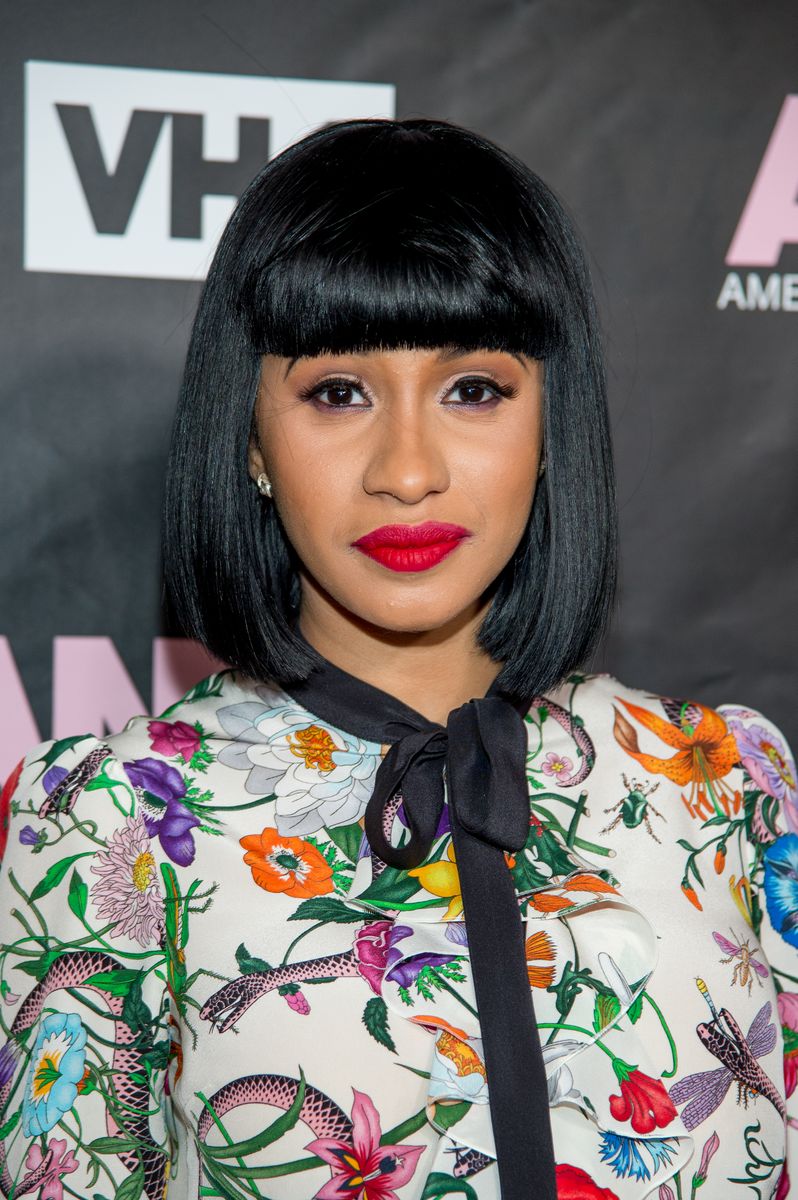 Sleek Black Bob with Blunt Bangs